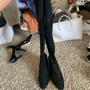 Thigh high heeled boots